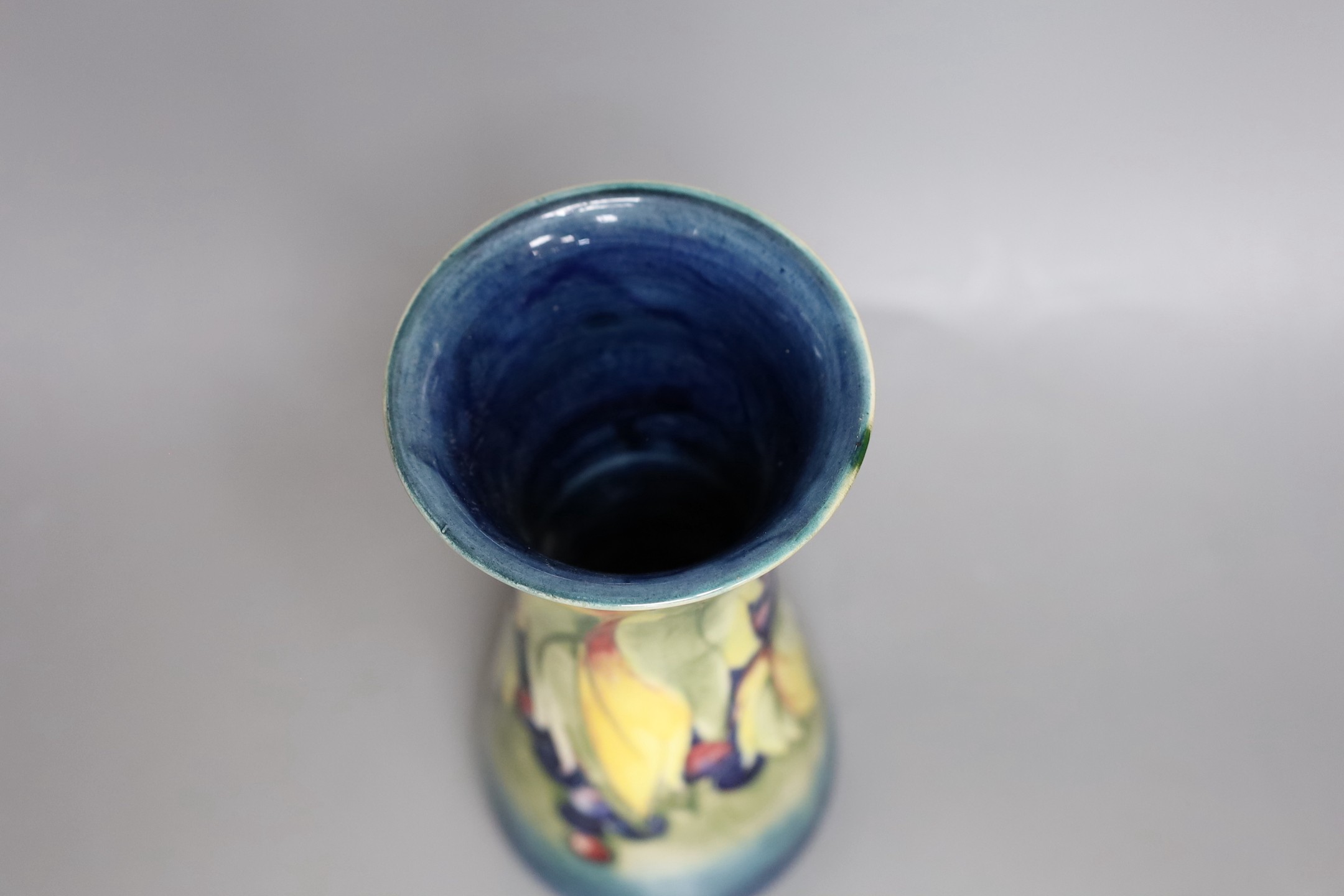 A Moorcroft leaf and berry vase, 26cm